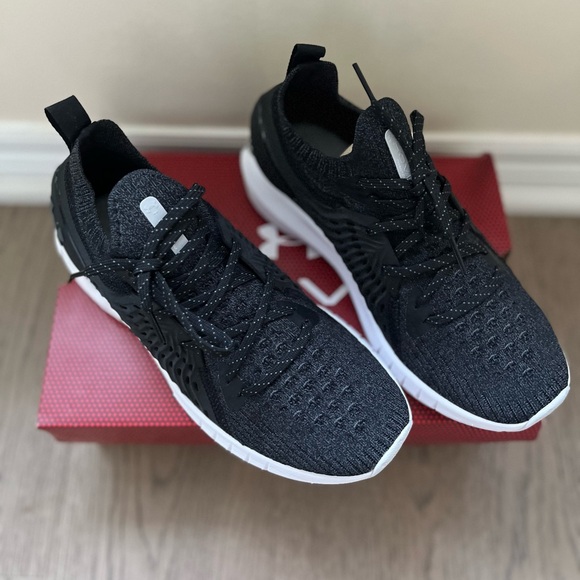 Black and white women’s Under Armour athletic shoes - Picture 2 of 7